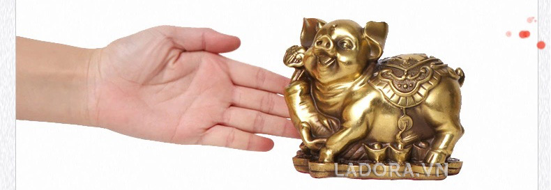 tượng con heo để bàn mang lại phúc lộc vẹn toàn cho gia chủ