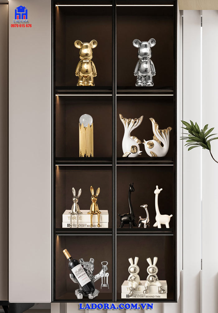 Trang trí tượng gia đình hươu trên kệ tủ